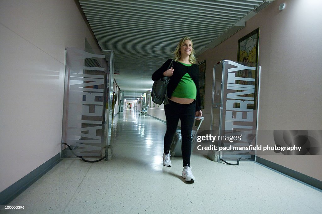 Pregnancy walking towards maternity ward