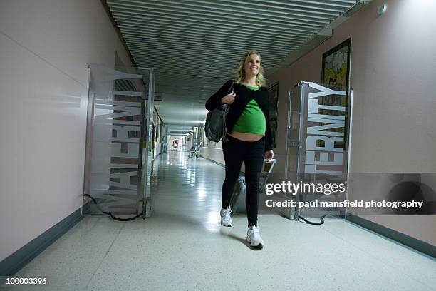 pregnancy walking towards maternity ward - mansfield england stock pictures, royalty-free photos & images