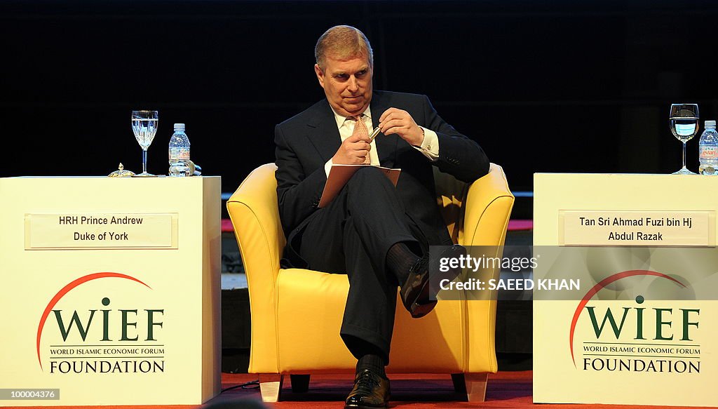 Britain's Prince Andrew waits to address