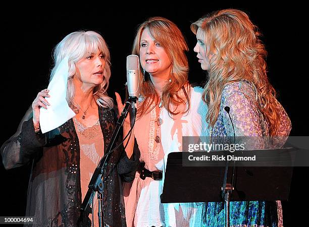 Recording Artists Emmylou Harris, Patty Loveless and Alison Krauss perform during the "Music Saves Mountains" benefit concert at the Ryman Auditorium...