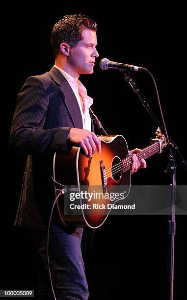 Singer/Songwriter Brandon Young performs during the "Music Saves Mountains" benefit concert at the Ryman Auditorium on May 19, 2010 in Nashville,...