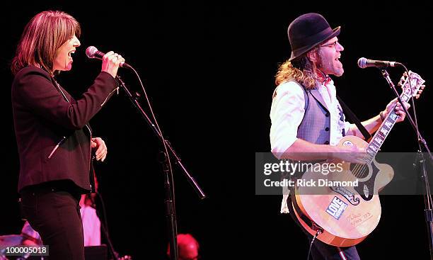 Singers/Songwriters Kathy Mattea and Big Kenny Alphin perform during the "Music Saves Mountains" benefit concert at the Ryman Auditorium on May 19,...