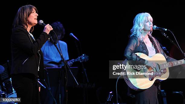 Singers/Songwriters Kathy Mattea and Emmylou Harris perform during the "Music Saves Mountains" benefit concert at the Ryman Auditorium on May 19,...
