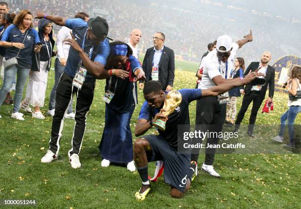 Paul Pogba of France celebrates the victory with his mother Yeo Pogba and his brothers Florentin Pogba, Mathias Pogba following the 2018 FIFA World...
