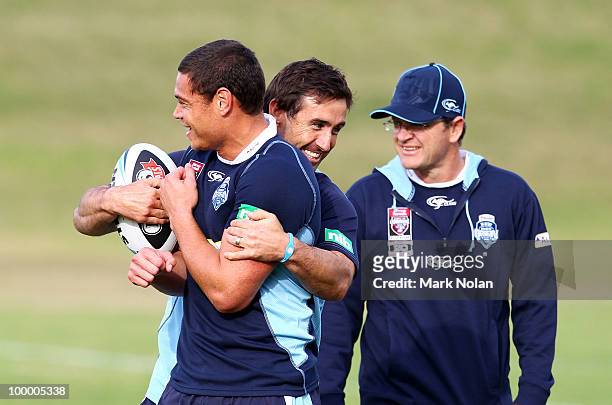 Timana Tahu and Andrew Johns joke during a New South Wales Origin training session at WIN Stadium on May 20, 2010 in Wollongong, Australia.