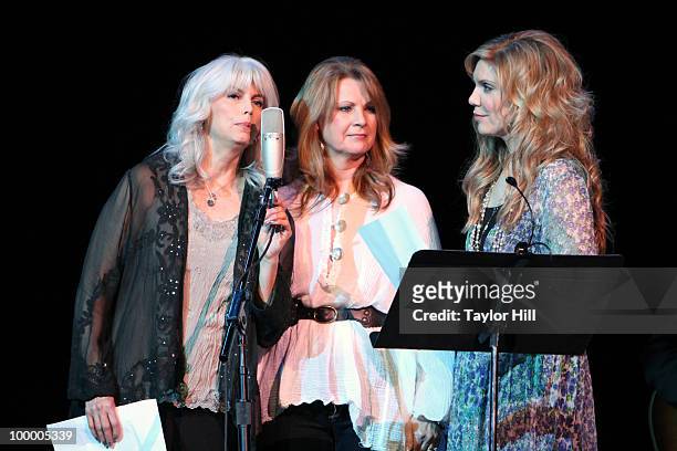 Emmylou Harris, Patty Loveless and Allison Krauss performs during the Music Saves Mountains benefit concert at the Ryman Auditorium on May 19, 2010...