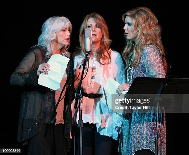 Emmylou Harris, Patty Loveless and Allison Krauss perform during the Music Saves Mountains benefit concert at the Ryman Auditorium on May 19, 2010 in...