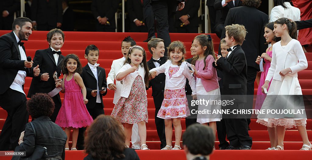 French TV host Mouloud Achour (L) arrive