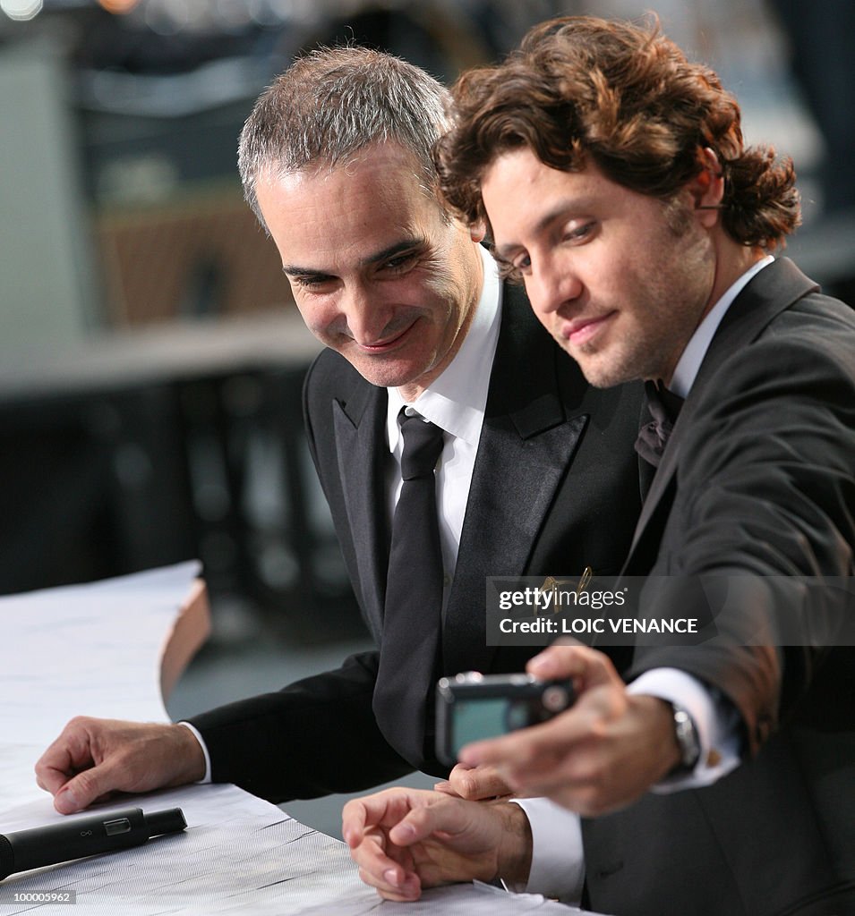 French director Olivier Assayas (L) and