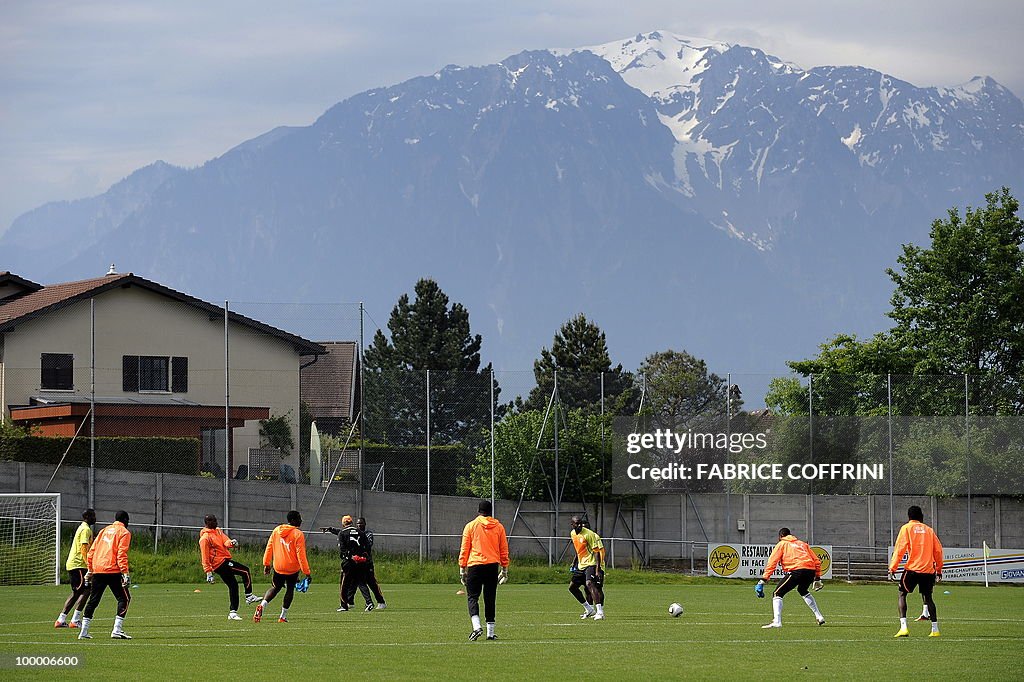 Ivory Coast football players warm-up dur