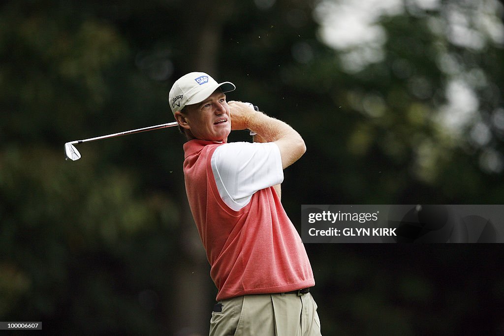 South African golfer Ernie Els watches h