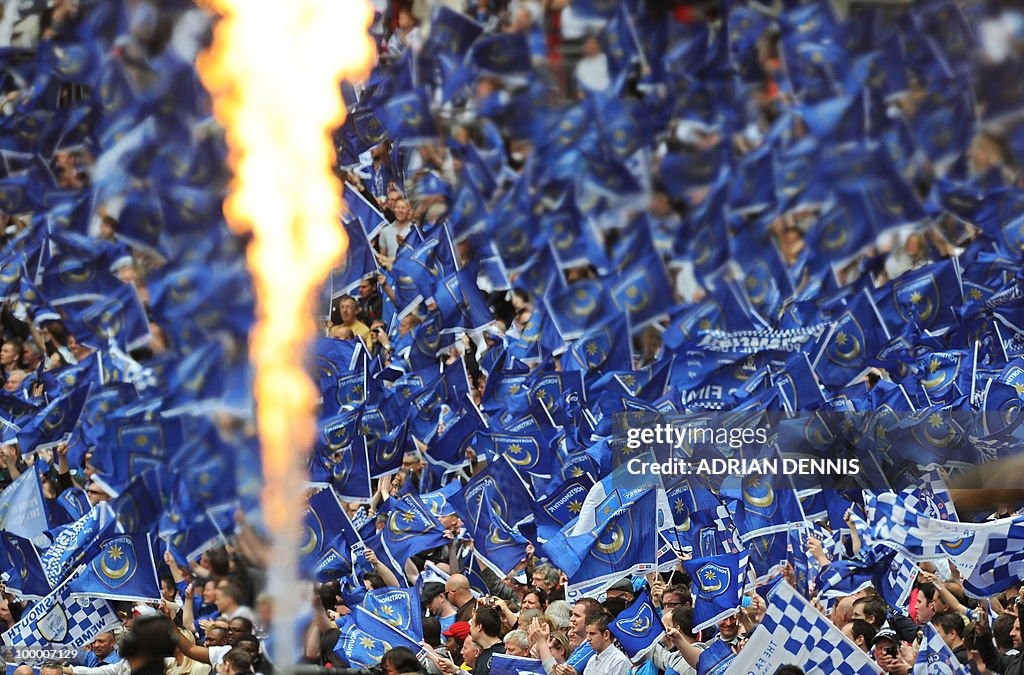 Portsmouth fans cheer for their team aga