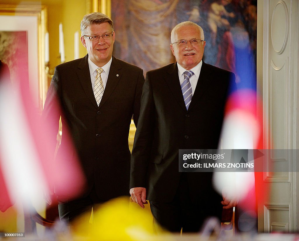 Czech President Vaclav Klaus (R) and his