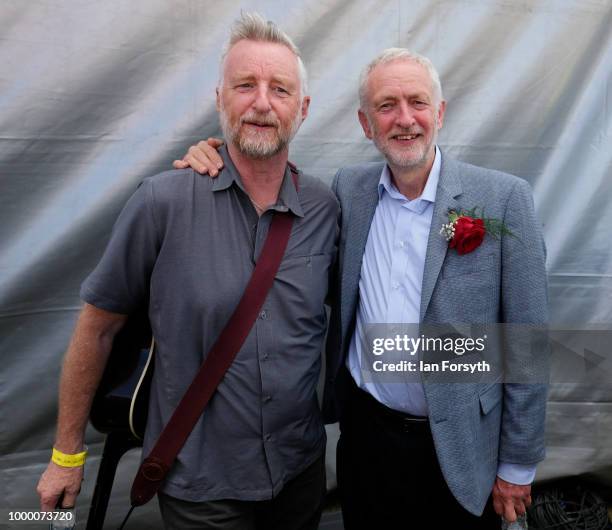 Labour Leader Jeremy Corbyn poses with singer Billy Bragg during the 134th Durham Miners’ Gala on July 14, 2018 in Durham, England. Over two decades...