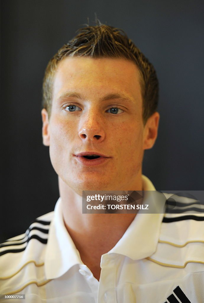 Germany's defender Marcell Jansen gives