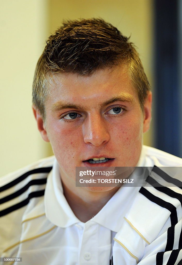 Germany's midfielder Toni Kroos gives an