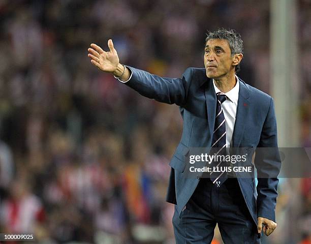 Sevilla´s coach Antonio Alvarez Giraldez gives instructions to his players during the King�s Cup final match Sevilla against Atletico Madrid at the...