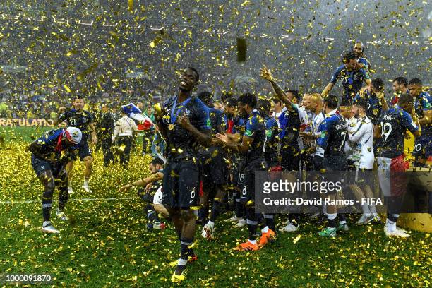 Paul Pogba of France celebrates with the World Cup Trophy and his team mates following his side victory in the 2018 FIFA World Cup Russia Final...