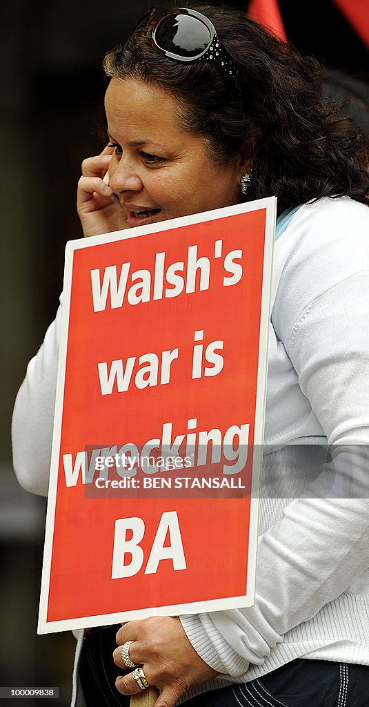 A supporter of Unite holds a placard out