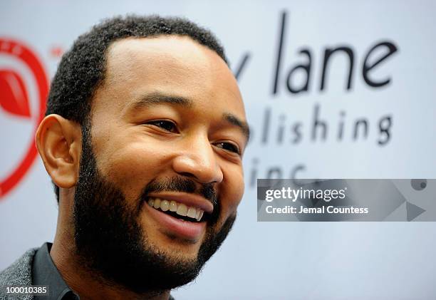 Singer John Legend speaks with press on the red carpet at the Cherry Lane Music Publishing's 50th Anniversary celebration at Brooklyn Bowl in...
