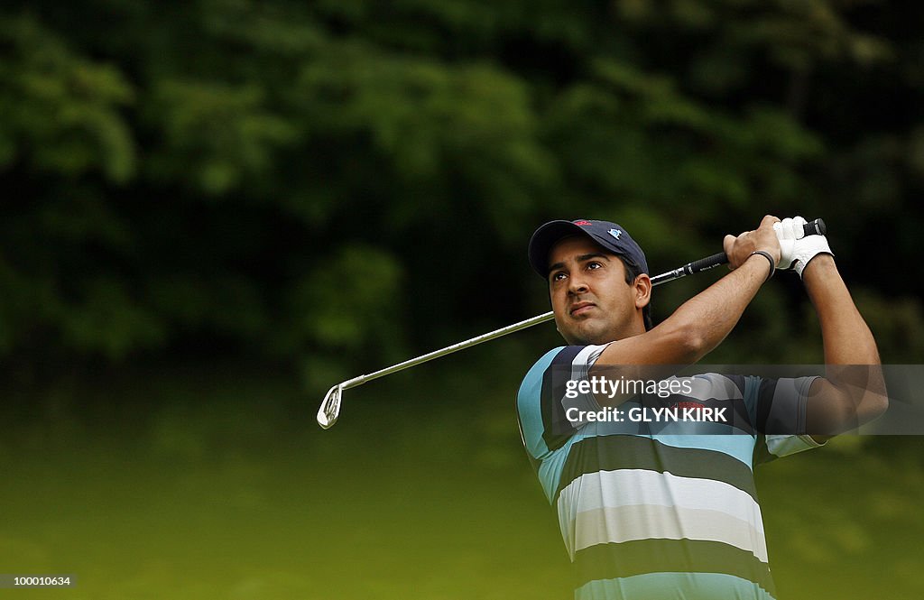 Indian golfer Shiv Kapur watches his dri