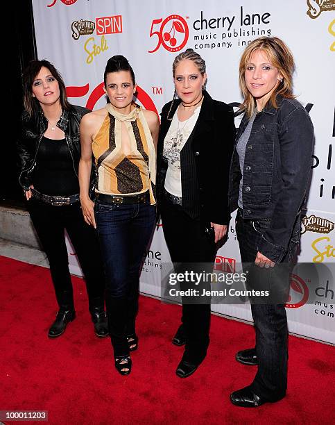 Nini Camps, Kristen Henderson, Cathy Henderson and Dena Tauriello of the band Antigone Rising pose on the red carpet at the Cherry Lane Music...