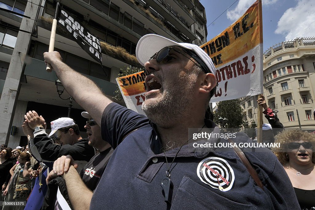 Striking teachers march in central Athen