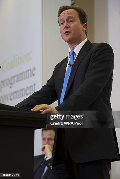 British Prime Minister David Cameron speaks during the launch of the Government Programme Coalition Agreement document in London, May 20, 2010. The...