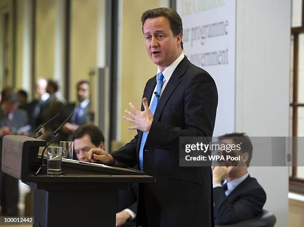 British Prime Minister David Cameron speaks during the launch of the Government Programme Coalition Agreement document in London, May 20, 2010. The...