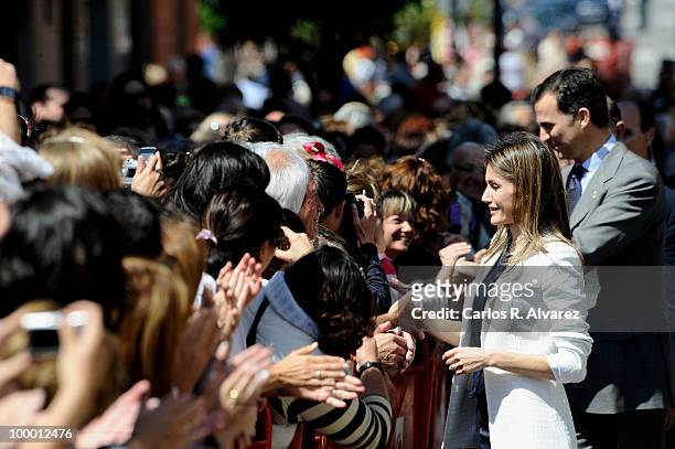 Prince Felipe of Spain and Princess Letizia of Spain are welcomed during her visit of "Infanta Leonor" school on May 20, 2010 in Castrillon,...