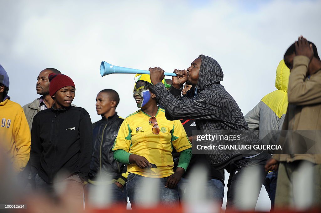 Football fan play the vuvuzela as hundre