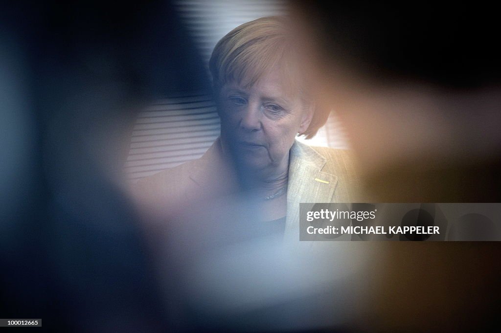 German Chancellor Angela Merkel waits fo