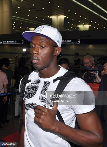 Jamaican sprinter and a three-time Olympic gold medalist Usain Bolt arrives at Shanghai Pudong airport for the IAAF Diamond League Shanghai on May...