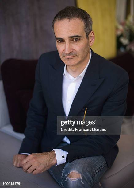 Director Olivier Assayas attends the "Carlos" portrait session at the Audi Beach during the 63rd Annual Cannes Film Festival on May 20, 2010 in...