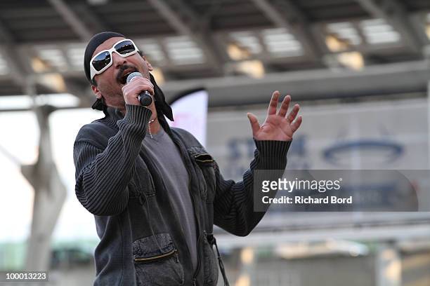 Singer Cheb Tarik performs onstage at the World Charity Soccer 2010 Charity Match for Haiti at Stade Charlety on May 19, 2010 in Paris, France.