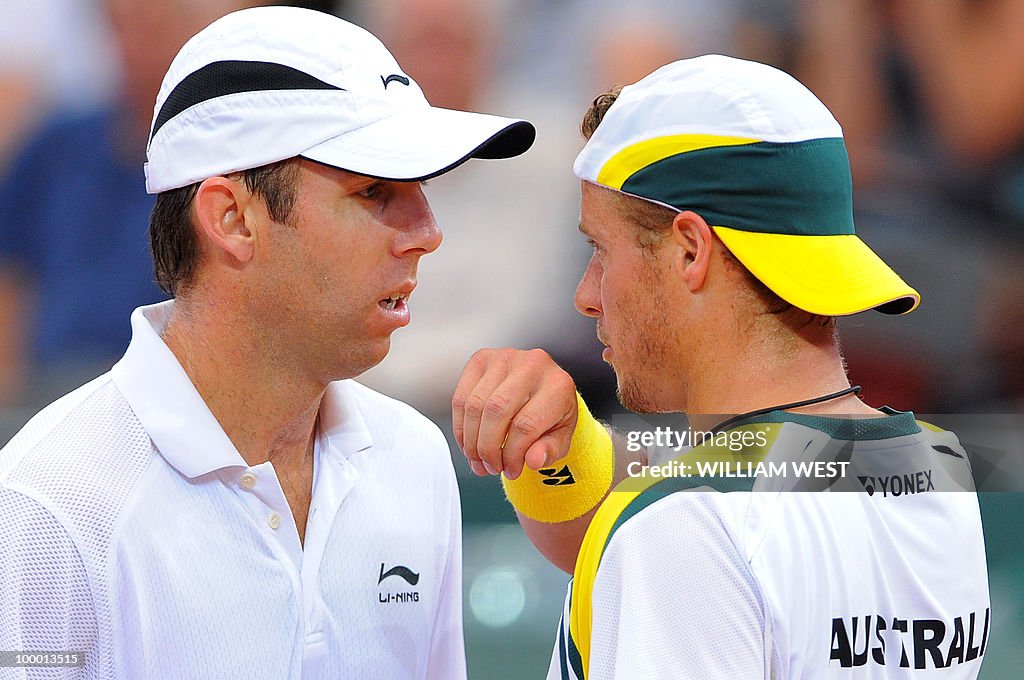 Lleyton Hewitt (R) and Paul Hanely of Au