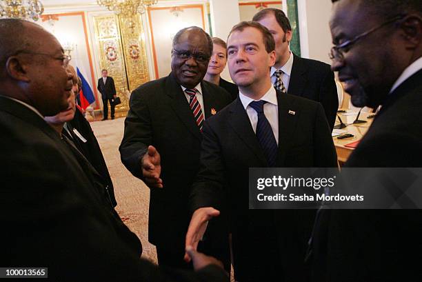 Russian President Dmitry Medvedev and Namibian President Pohamba meets with members of the delegation at the Kremlin on May 20, 2010 in Moscow,...