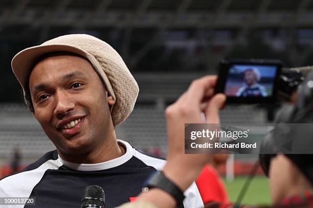 Doc Gyneco gives an interview during the World Charity Soccer 2010 Charity Match for Haiti at Stade Charlety on May 19, 2010 in Paris, France.