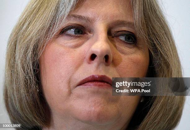 Britain's Home Secretary Theresa May attends the launch of the Government Programme Coalition Agreement document as British Deputy Prime Minister...