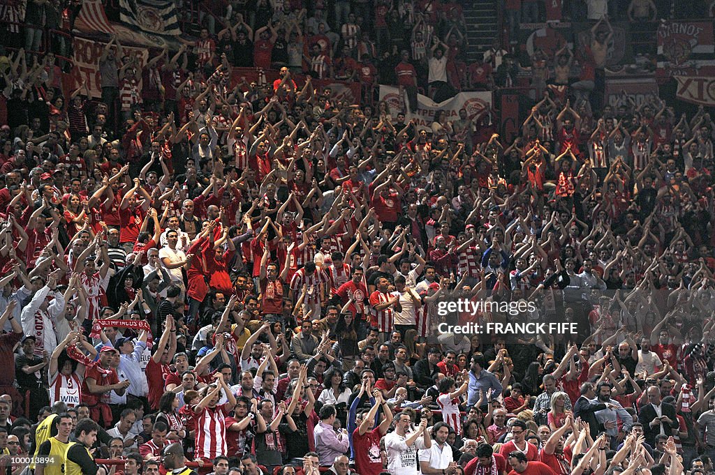 Greek supporters of Olympiakos celebrate