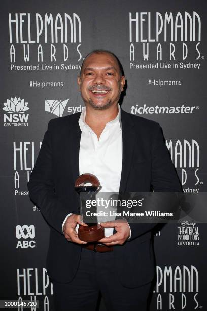 Stephen Page poses with the award for Best Dance Production for 'Bennelong' during at the 18th Annual Helpmann Awards at Capitol Theatre on July 16,...