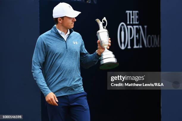 Jordan Spieth of the United States, winner of the 146th Open Championship, returns the Claret Jug to R&A Chief Executive, Martin Slumbers on the...