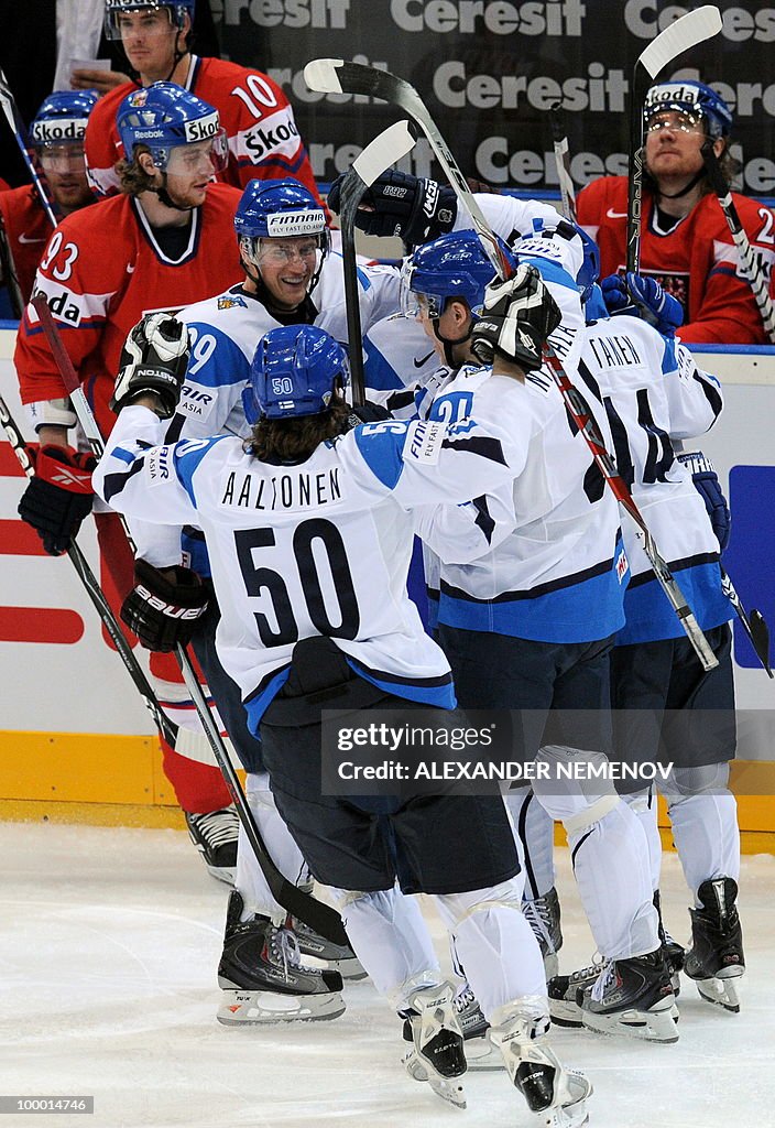 Finland's players celebrates scoring dur