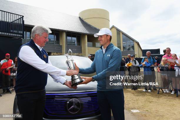 Jordan Spieth of the United States, winner of the 146th Open Championship, returns the Claret Jug to R&A Chief Executive, Martin Slumbers on the...