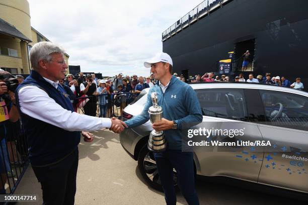 Jordan Spieth of the United States, winner of the 146th Open Championship, returns the Claret Jug to R&A Chief Executive, Martin Slumbers on the...