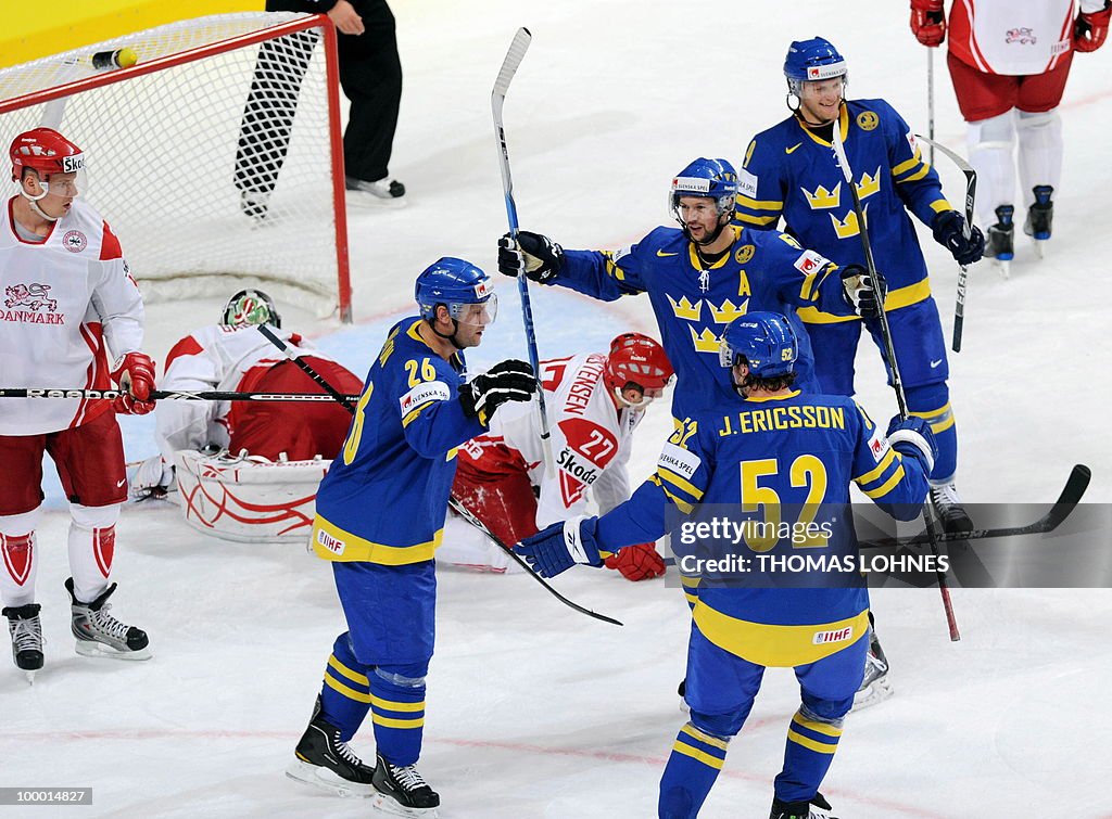 Sweden's players celebrate scoring durin