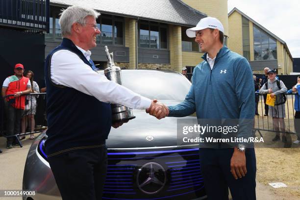 Jordan Spieth of the United States, winner of the 146th Open Championship, returns the Claret Jug to R&A Chief Executive, Martin Slumbers on the...