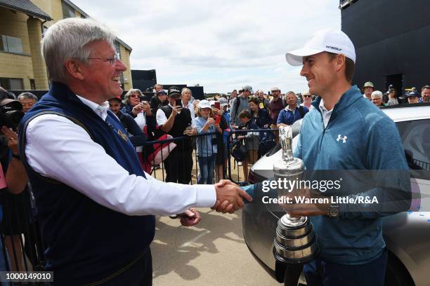 Jordan Spieth of the United States, winner of the 146th Open Championship, returns the Claret Jug to R&A Chief Executive, Martin Slumbers on the...