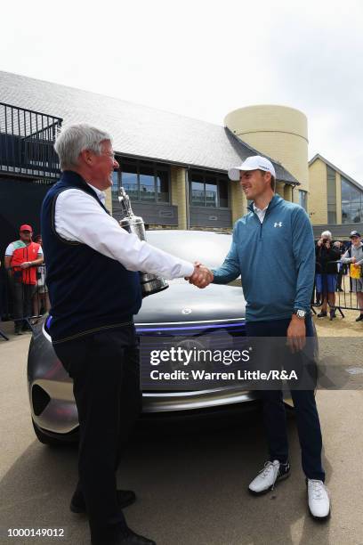 Jordan Spieth of the United States, winner of the 146th Open Championship, returns the Claret Jug to R&A Chief Executive, Martin Slumbers on the...