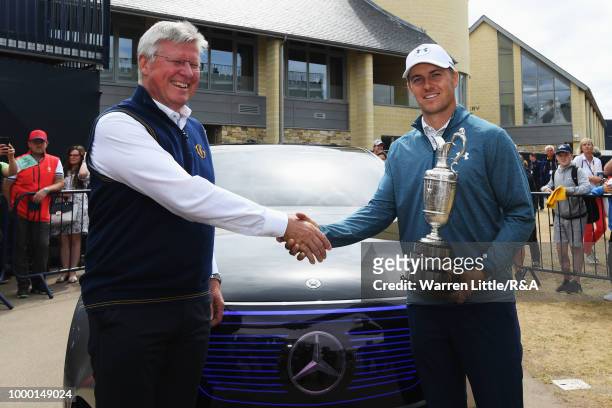 Jordan Spieth of the United States, winner of the 146th Open Championship, returns the Claret Jug to R&A Chief Executive, Martin Slumbers on the...